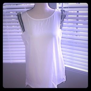 White blouse with bead details